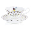 Fine bone china tea cup with saucer, white porcelain with gold trim and woman illustration