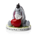 Eeyore fine bone china figurine holding a red heart, seated on decorative round base