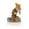 Fine bone china dwarf figurine in brown outfit, white beard, on gray rock base