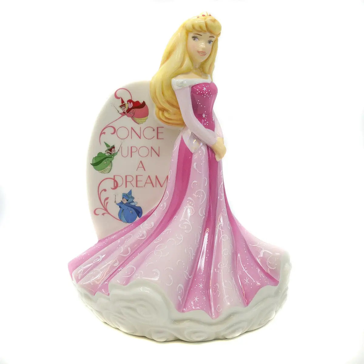 Fine bone china flatback figurine of a blonde woman in a pink gown, hands held at chest