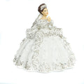 Fine bone china figurine of a brunette girl in a white lace dress