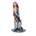 Fine bone china Sally figurine of a standing doll with red hair and patchwork dress
