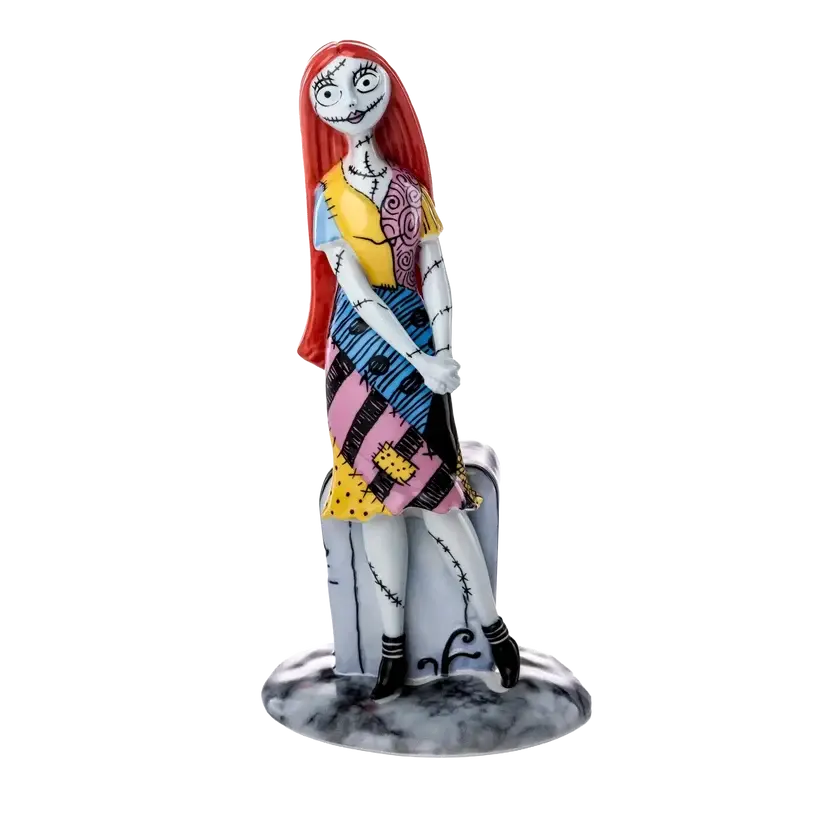 Fine bone china Sally figurine of a standing doll with red hair and patchwork dress