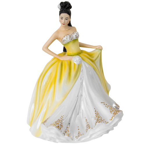 Yellow and white dress figurine, porcelain lady with beaded bodice and updo hair