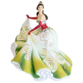 Porcelain Christmas figurine of a woman in a white, green, and red swirl dress
