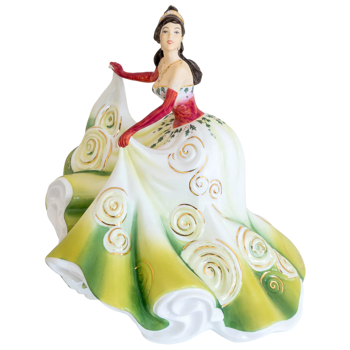Porcelain Christmas figurine of a woman in a white, green, and red swirl dress
