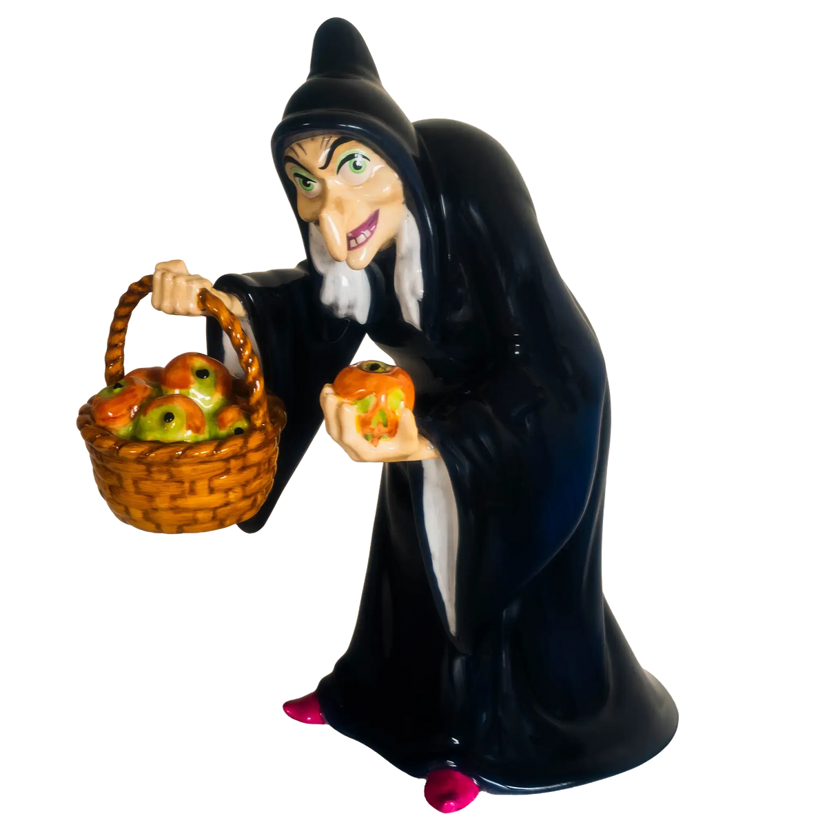 Dark blue witch figurine holding a basket of glowing apples, fine bone china