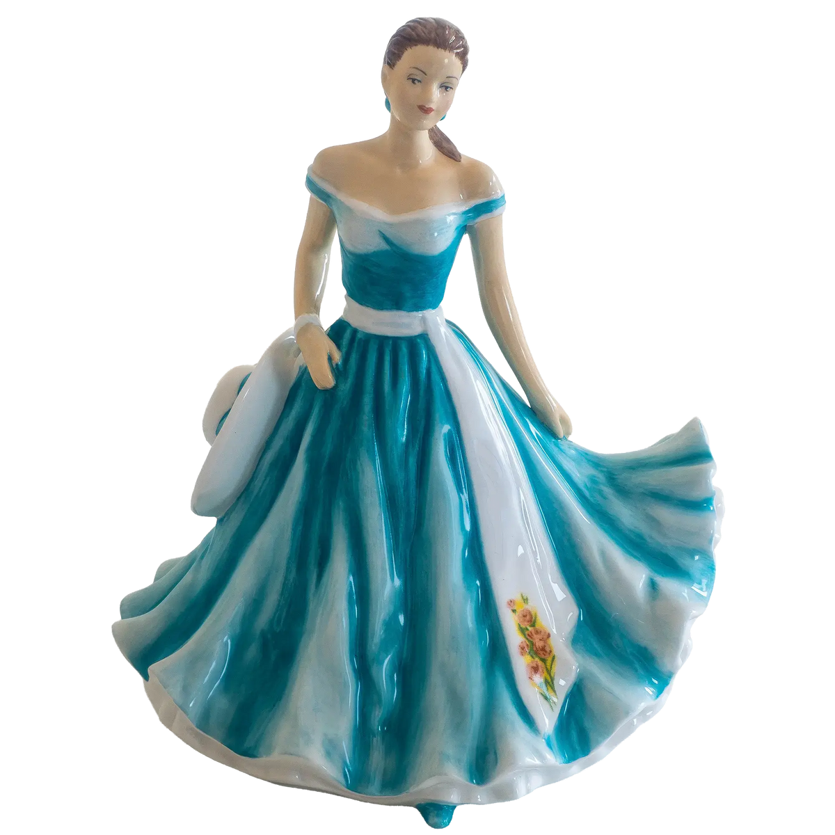 Teal and white porcelain figurine in off-shoulder gown with flared skirt, front view