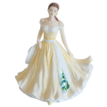 Fine bone china ballerina figurine in off-shoulder white and yellow dress with floral panel