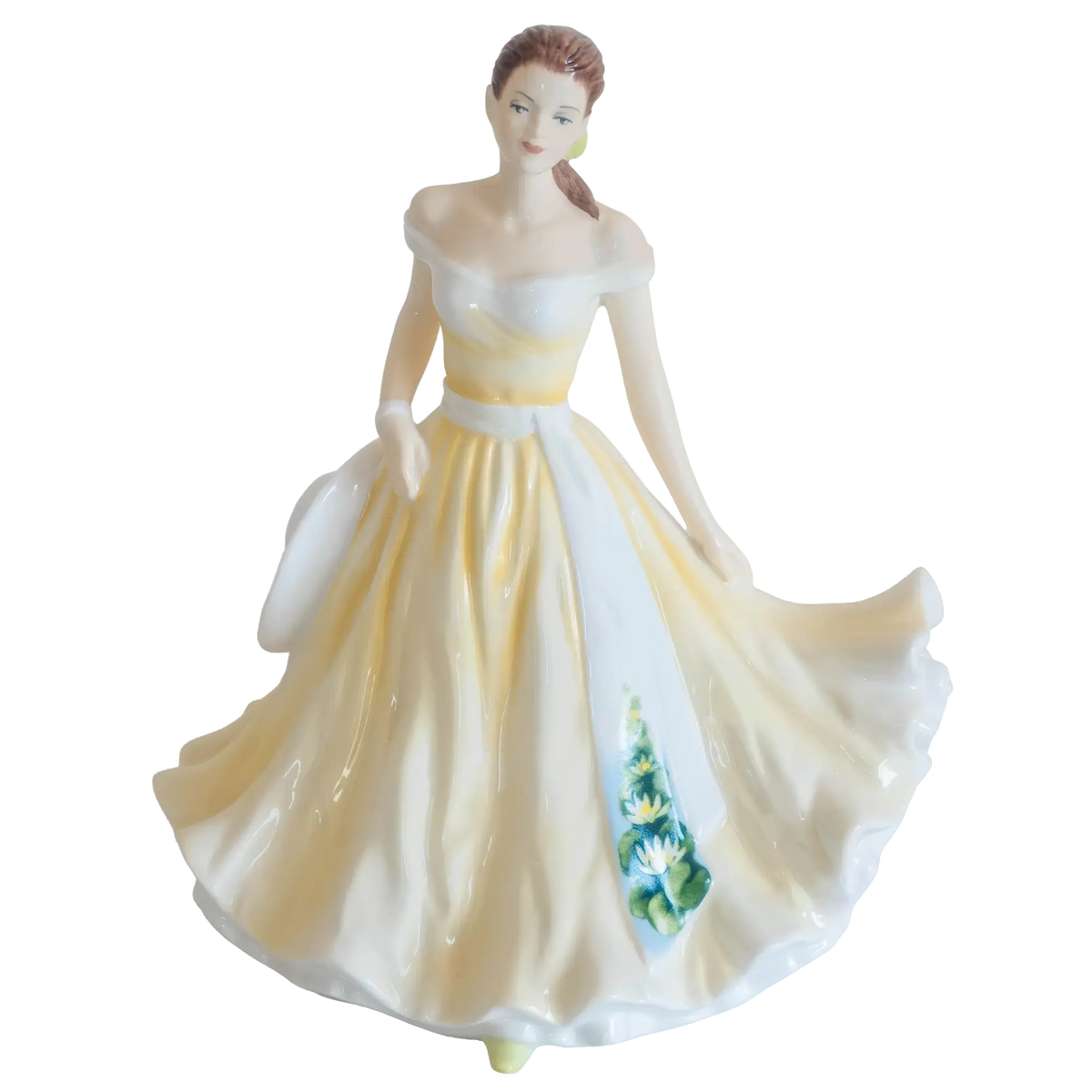 Fine bone china ballerina figurine in off-shoulder white and yellow dress with floral panel