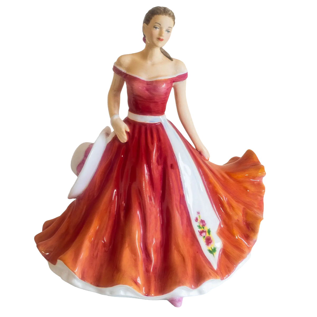 Bone china figurine of a woman in an off-shoulder red dress with orange skirt flare