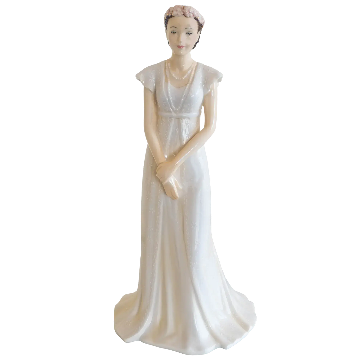 White fine bone china bride figurine with floral hairpiece and long flowing gown