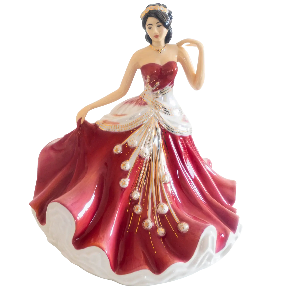 Porcelain lady figurine in strapless deep red dress with white ruffled hem and gold details