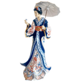 Porcelain lady figurine holding umbrella and small accessories, blue patterned kimono