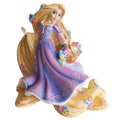 Purple and blue princess figurine holding a floral basket, kneeling pose
