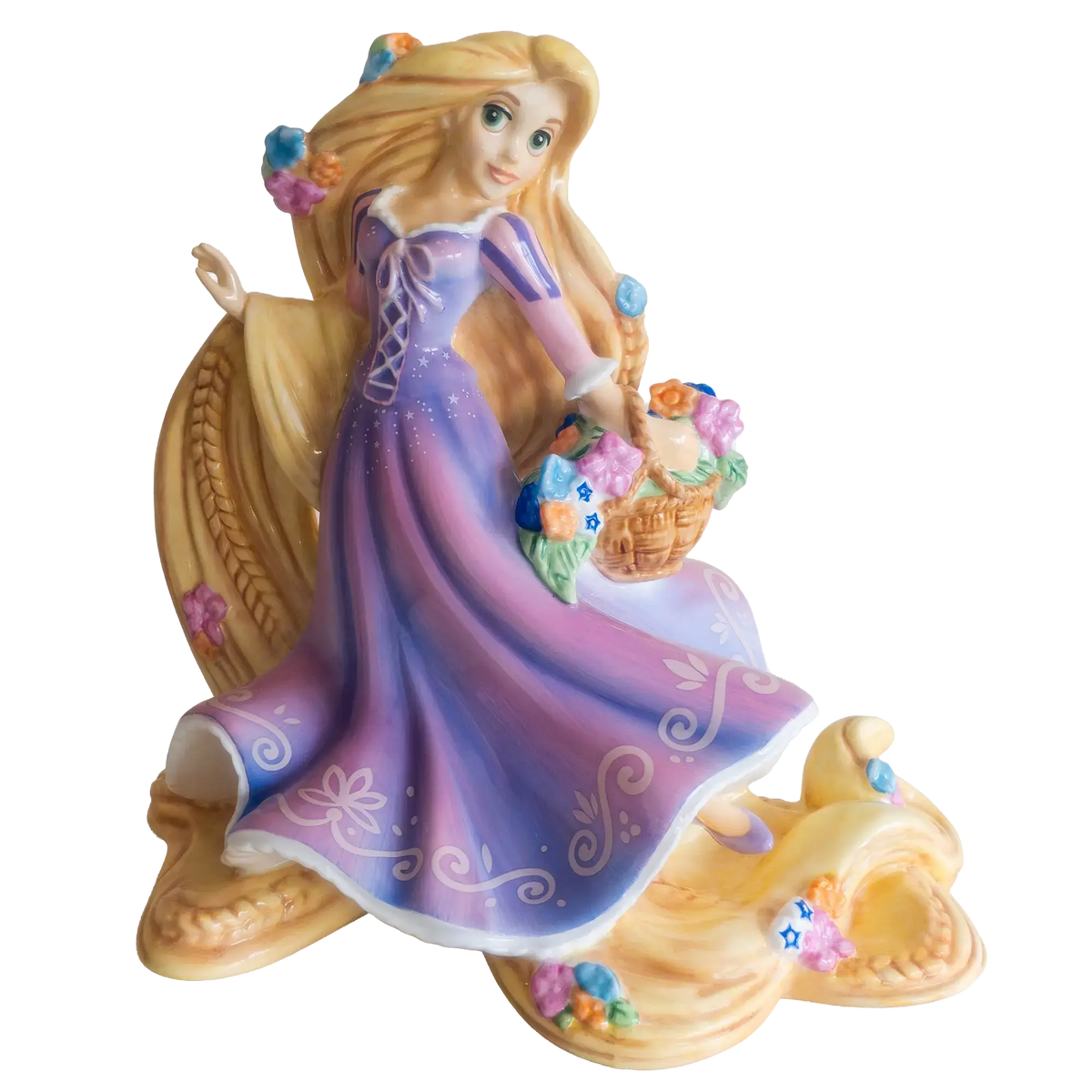 Purple and blue princess figurine holding a floral basket, kneeling pose