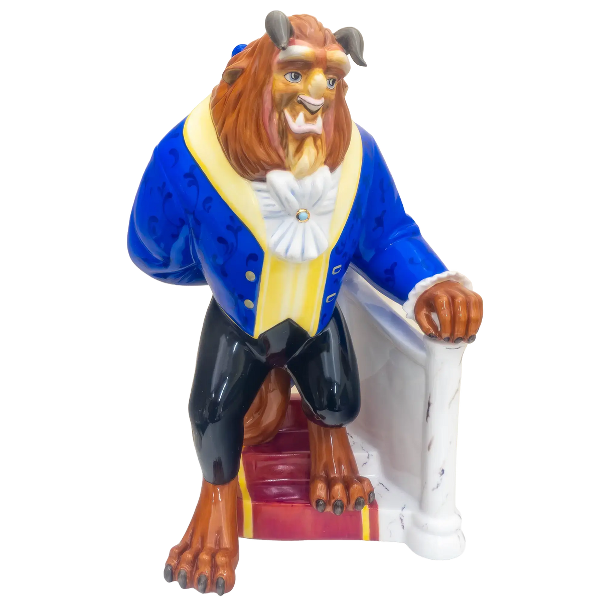 Fine bone china figurine of a lion-like beast in blue coat, holding white chair