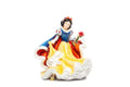 Fine bone china princess figurine, blue cape and yellow skirt, holding a bouquet