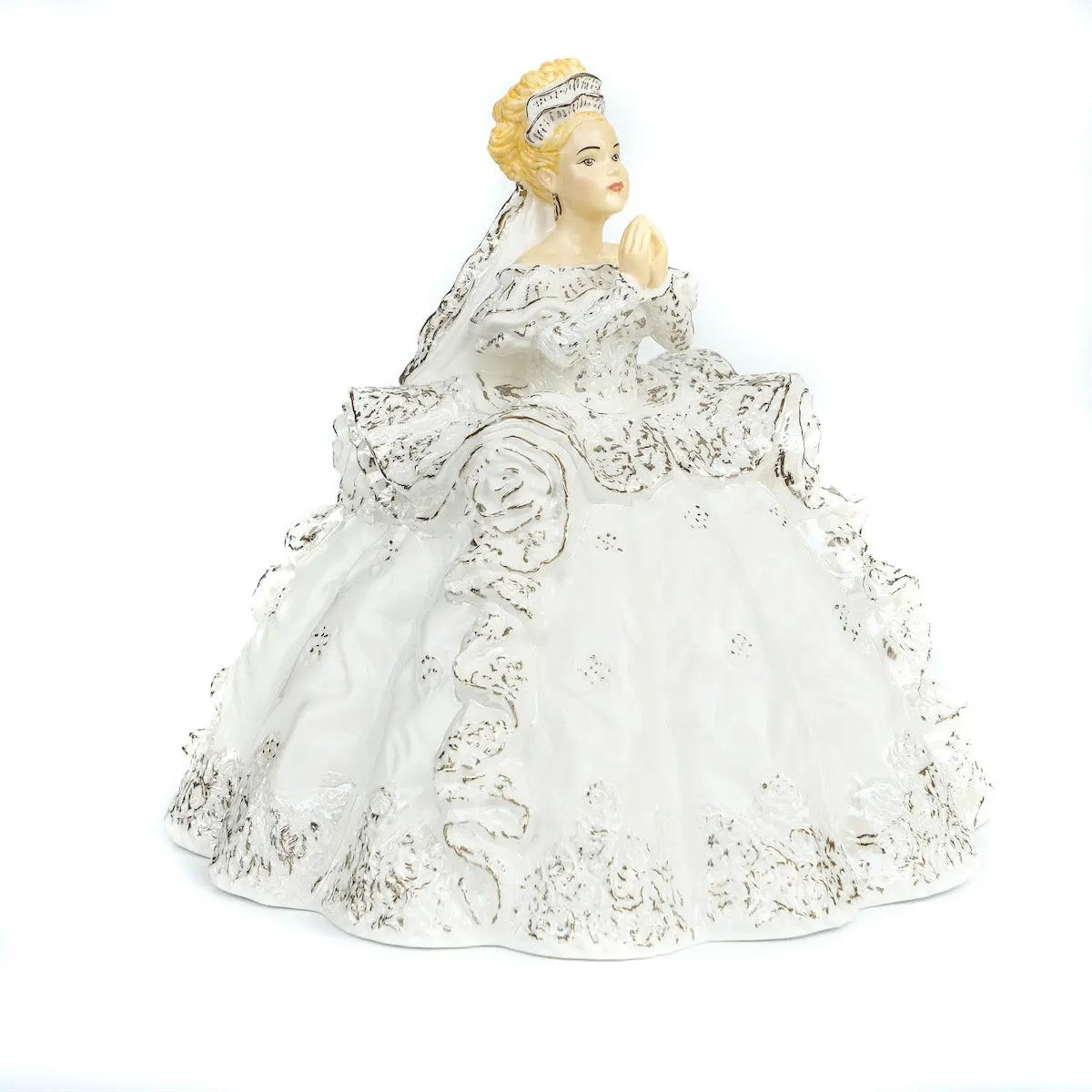 Fine bone china figurine of blonde girl in ornate praying dress, hands together