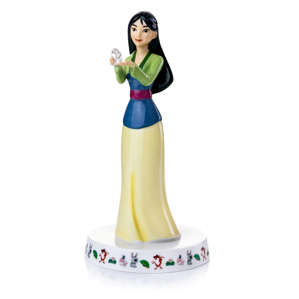 Fine bone china figurine front view in green and blue outfit holding a crystal