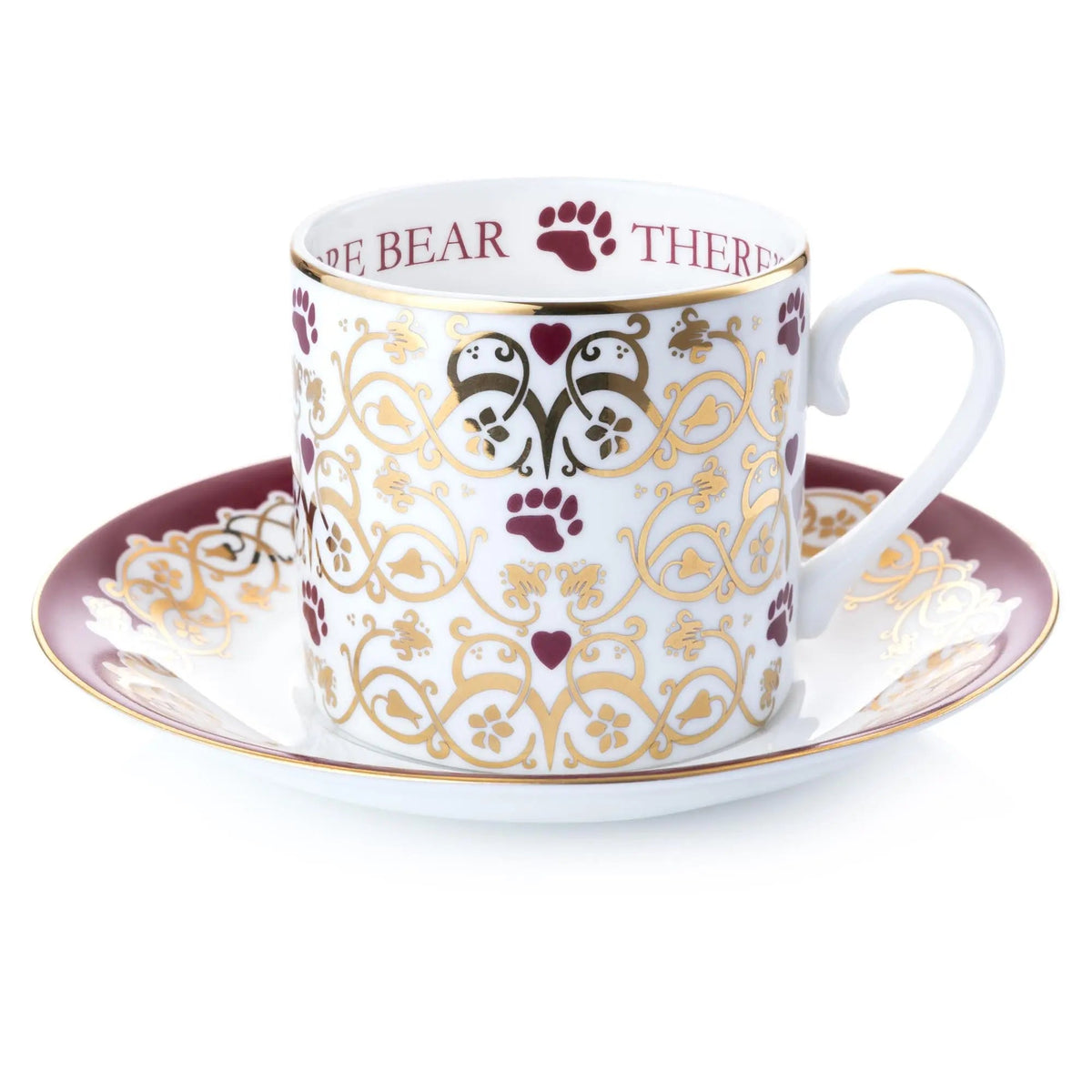 Fine bone china tea cup and saucer with gold scrollwork and burgundy paw motifs
