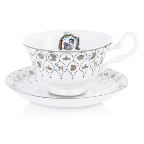Fine bone china teacup and saucer set with blue pattern, crest, and character art