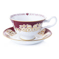 Fine bone china teacup and saucer set, white with maroon band and gold swirls