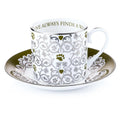 Fine bone china cup and saucer set, white with green accents and ornate floral pattern