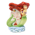 Mermaid figurine in fine bone china: red-haired woman, green tail on wave base.