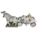 Fine bone china bride and horse figurine on carriage, blonde bride and pink flowers.