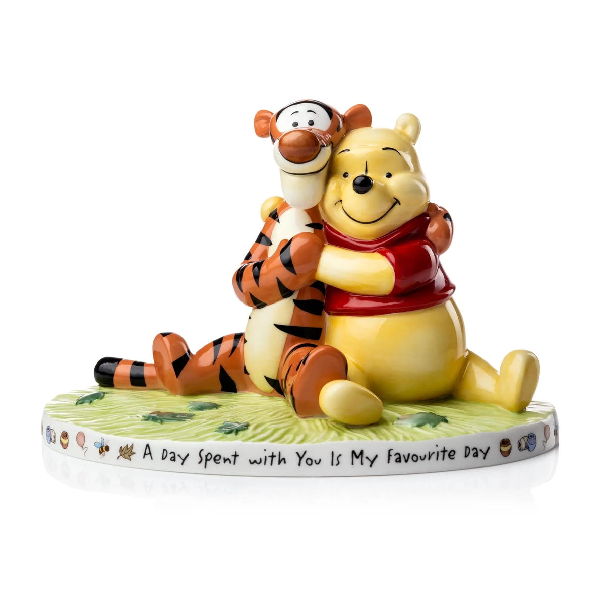 Winnie the Pooh fine bone china figure of Pooh holding Tigger on round inscribed base