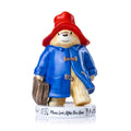 Fine bone china Paddington bear figurine in blue coat, red hat, holding suitcase
